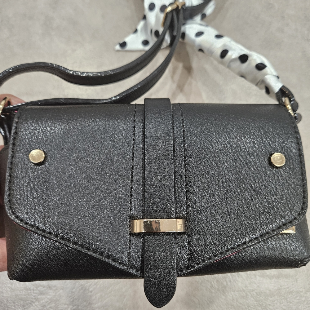 U.S. Polo Assn. Black Crossbody Bag with Polka Dot Accent